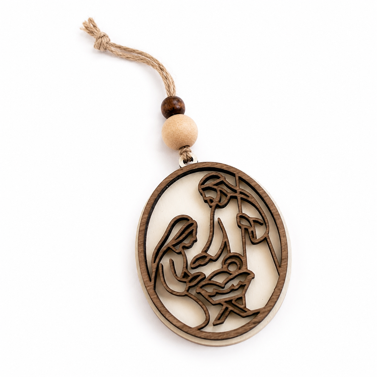 Cream stain nativity ornament displayed in cozy holiday setting