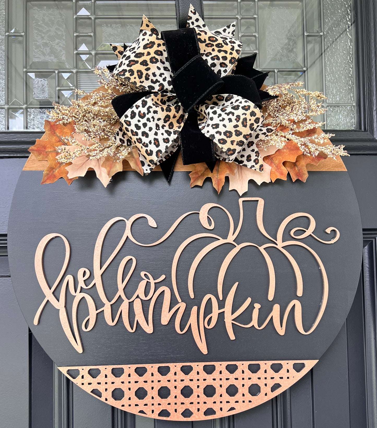 Hello Pumpkin black birchwood fall door hanger full front view on dark door with dramatic bow