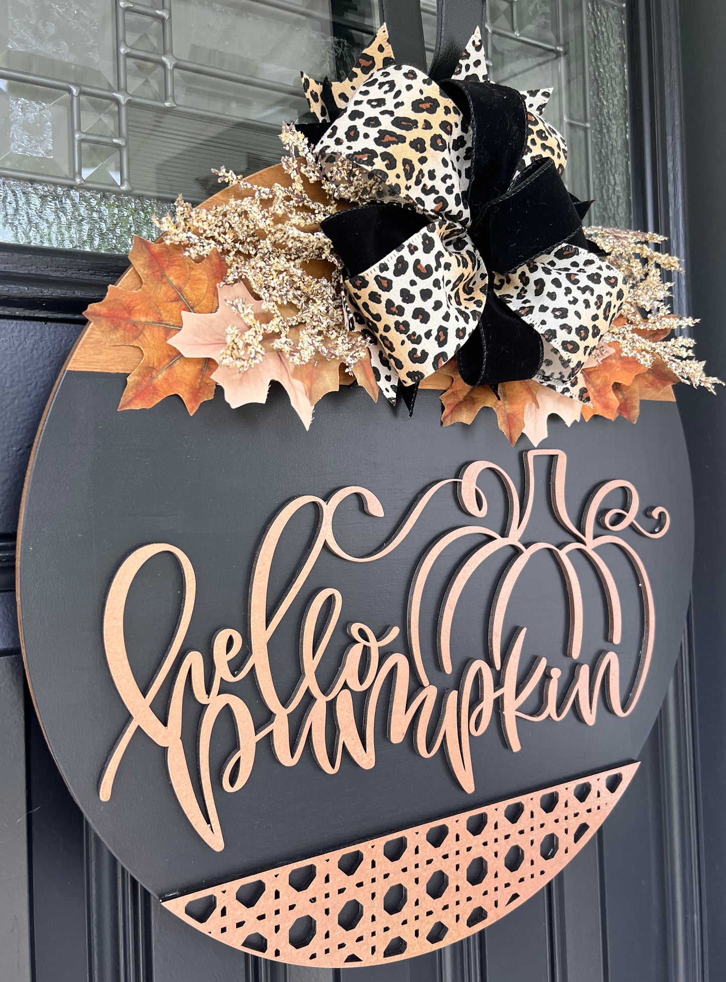 Hello Pumpkin black birchwood door hanger with leopard and black velvet bow and gold glitter botanicals on black front door