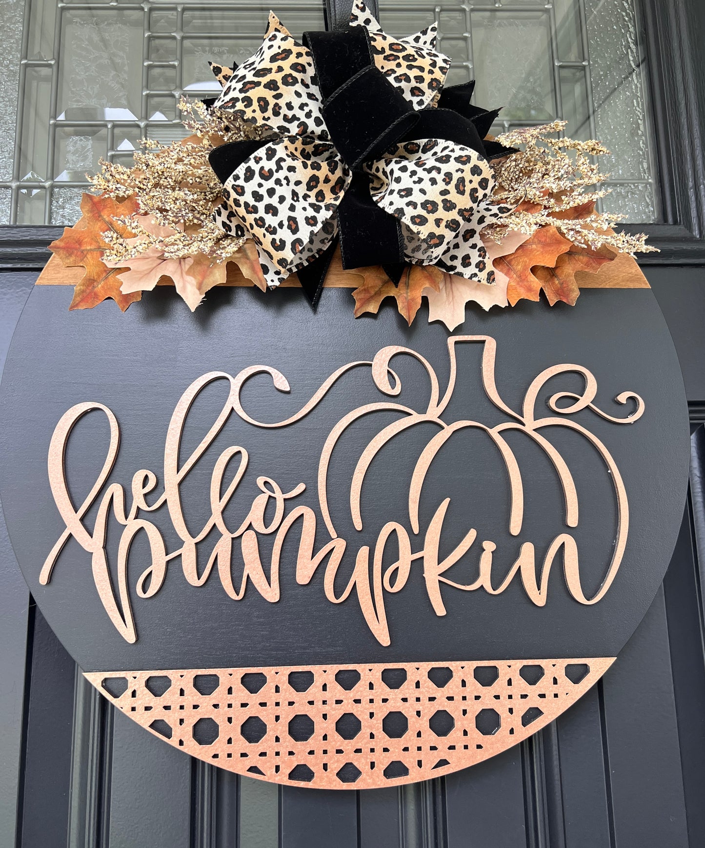 Hello Pumpkin black fall door hanger full view showing cane weave base detail and fall maple leaves