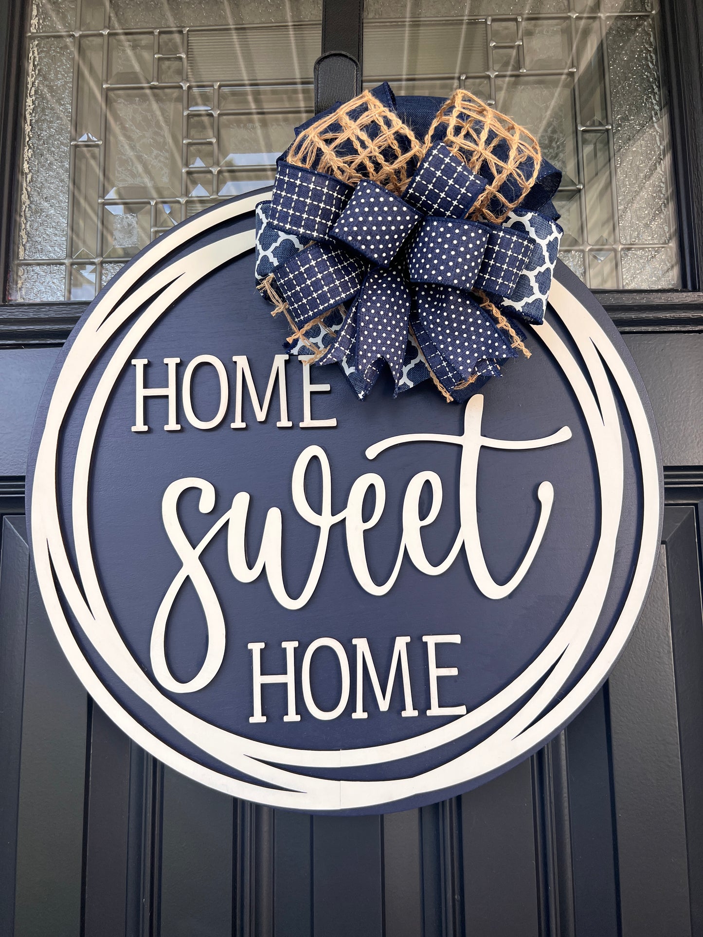 Home Sweet Home navy blue door hanger full front view showing complete 18 inch round with cream circle frame and layered navy bow