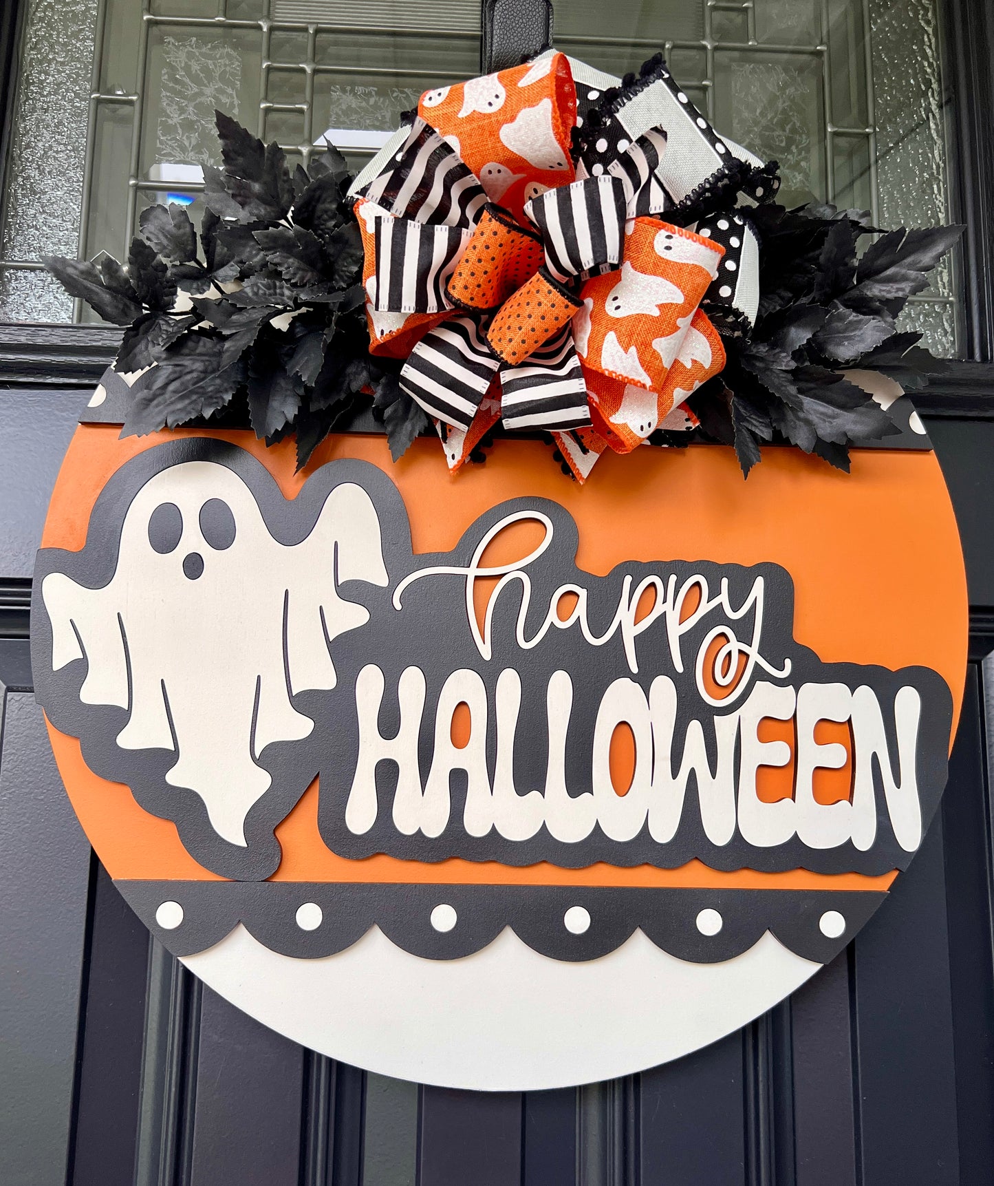 Happy Halloween door hanger full view showing scalloped polka dot border and complete bow detail