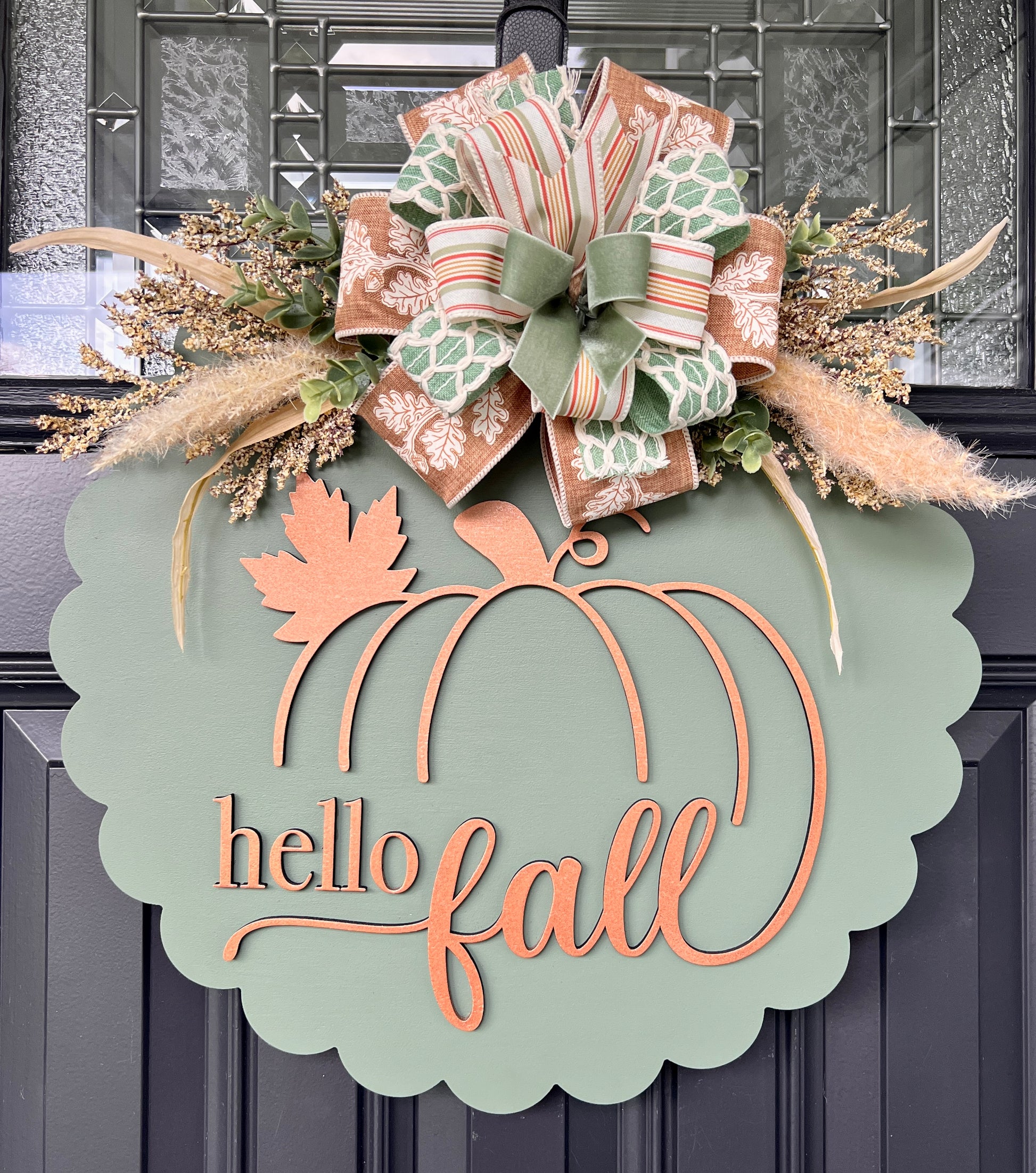 Hello fall pumpkin door hanger with sage velvet and burlap ribbon bow and pampas grass on front door