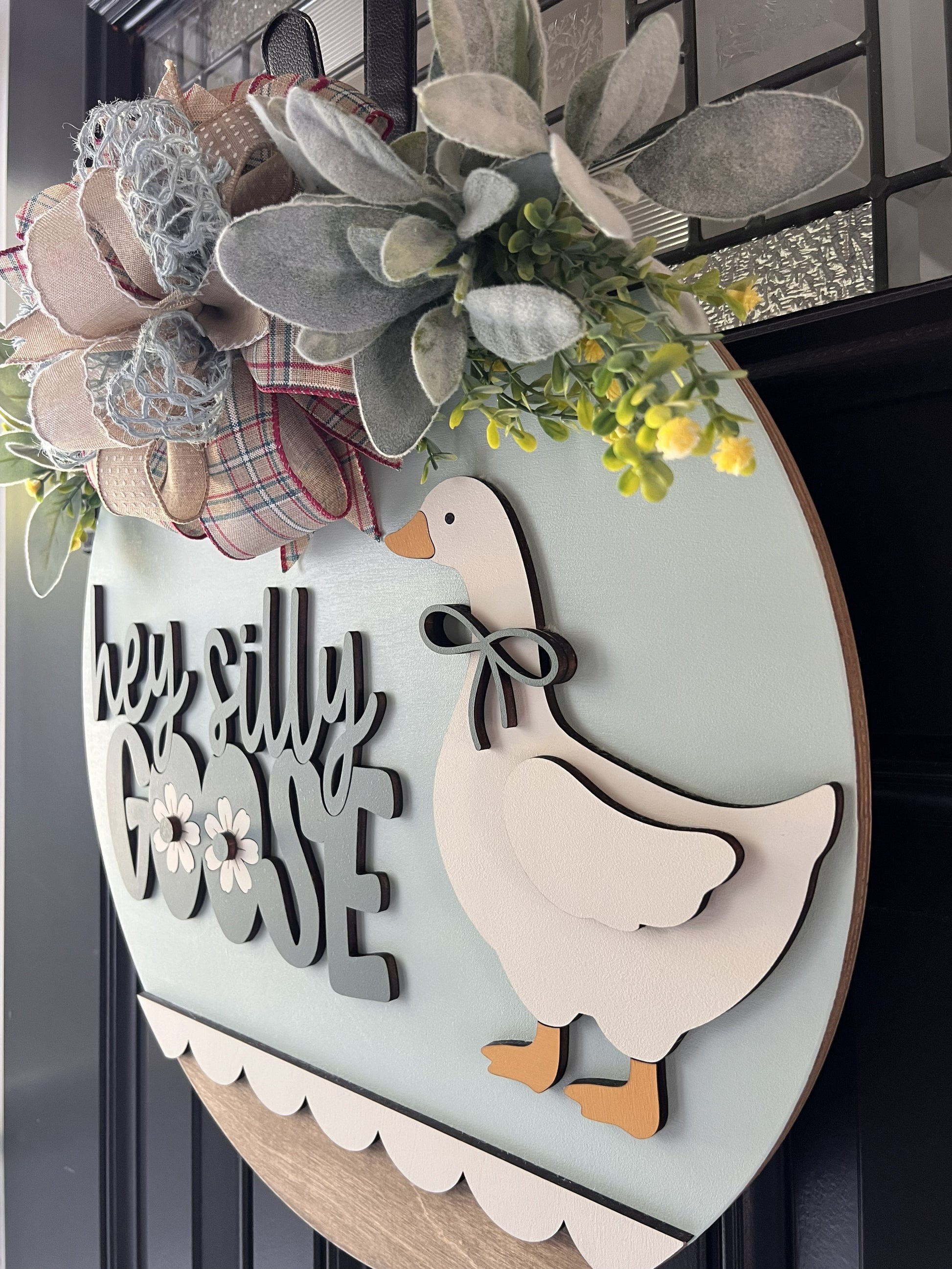 hey silly goose door hanger farmhouse decor
goose front door sign spring wooden door hanger
handmade goose wreath neutral farmhouse decor
cute goose sign front porch decor wood sign
layered wood goose door hanger with bow greenery