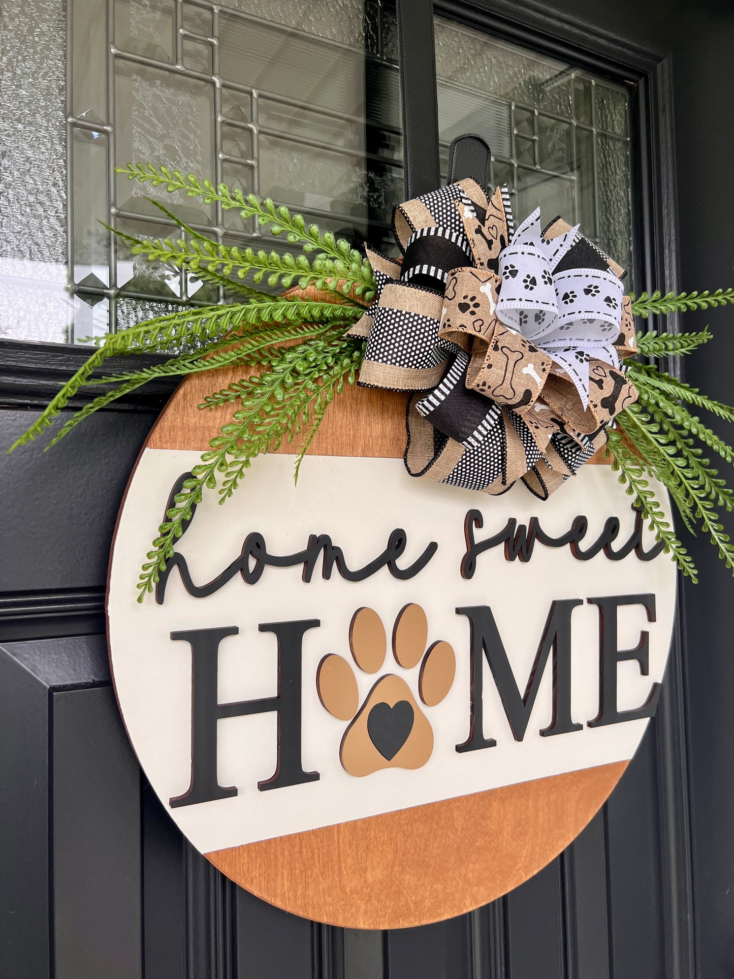 Home Sweet Home dog paw sign close up of golden paw print heart centerpiece