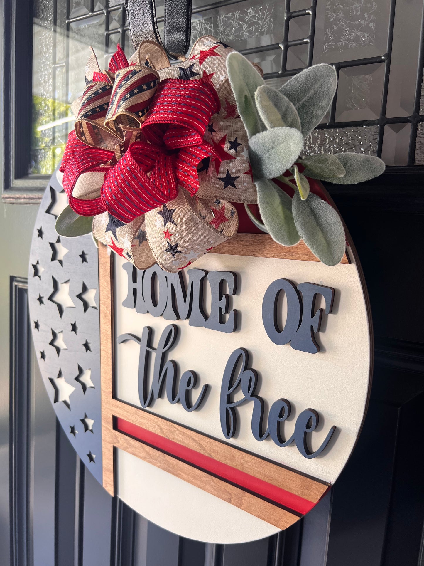 Patriotic “Home of the Free” Wooden Door Hanger – 18” Round
