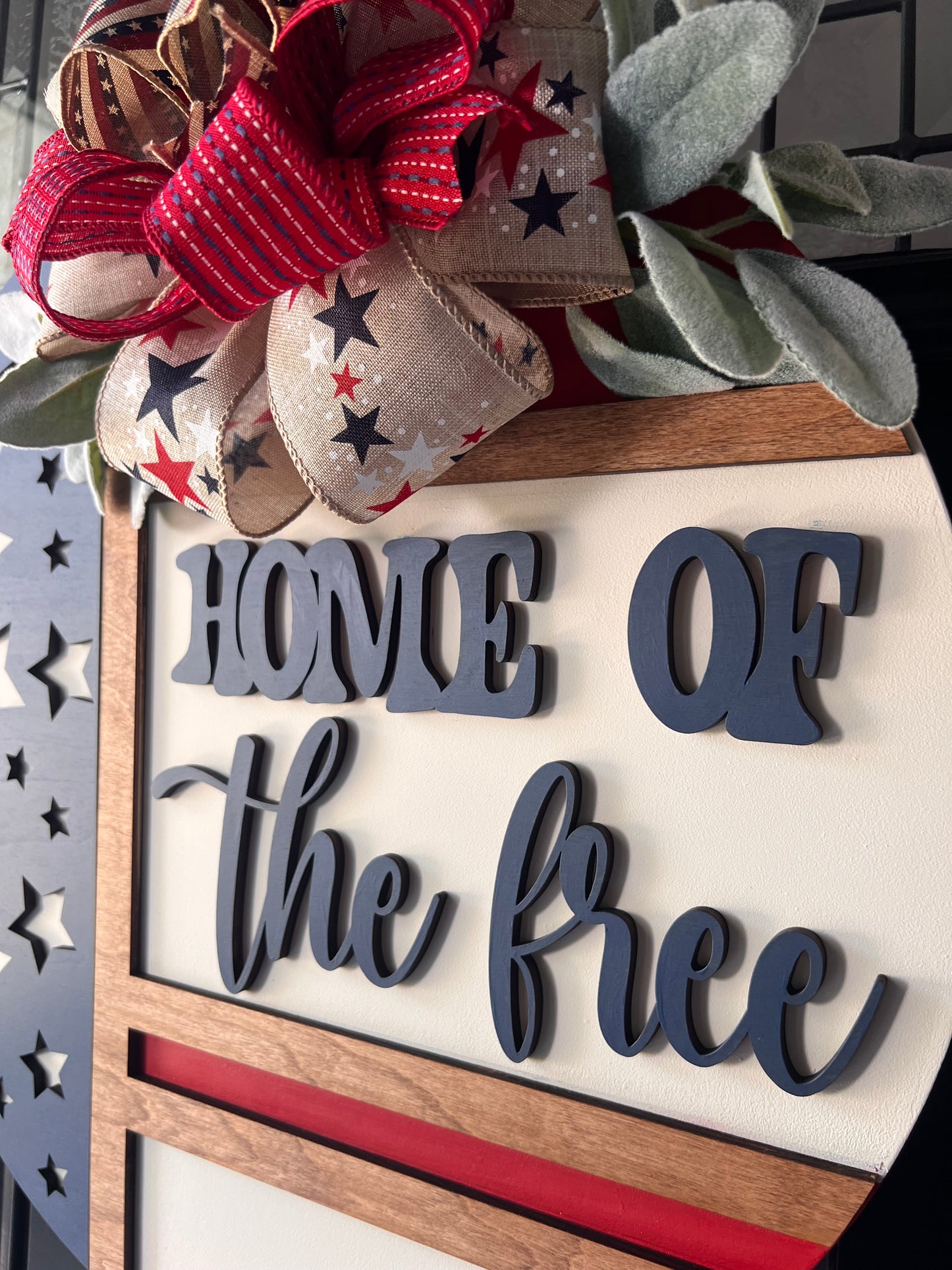 Patriotic “Home of the Free” Wooden Door Hanger – 18” Round