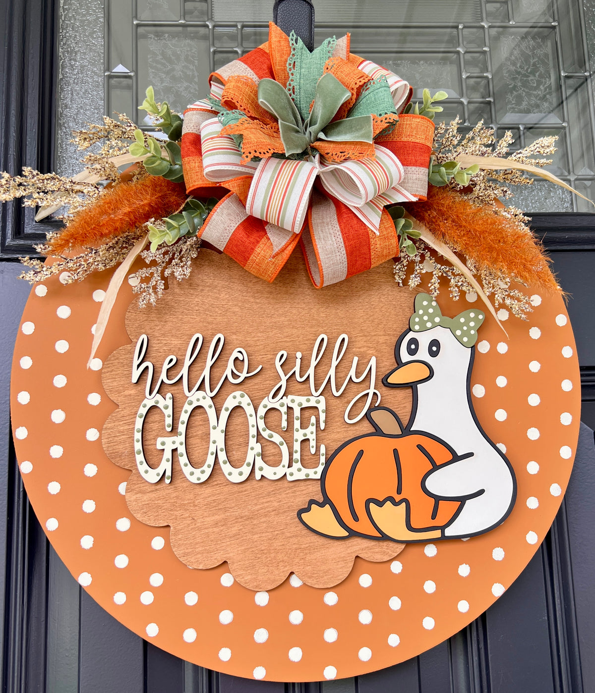 Polka dot orange door hanger with layered wood lettering and fall bow