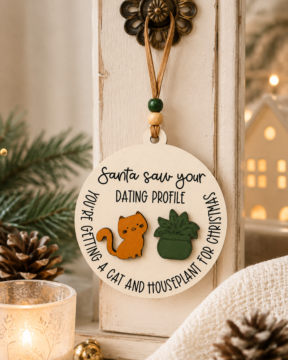 Round Santa Saw Your Dating Profile ornament displayed with wrapped holiday gifts