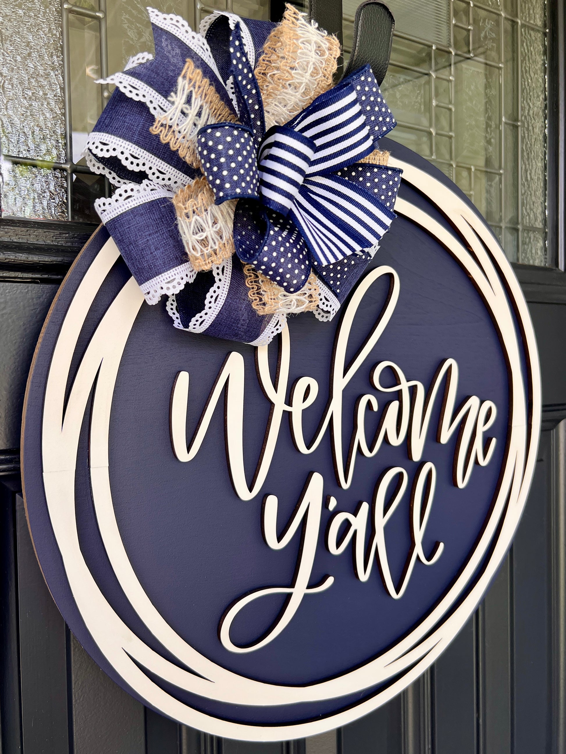 Welcome Y'all circle frame sign with layered burlap and lace bow detail