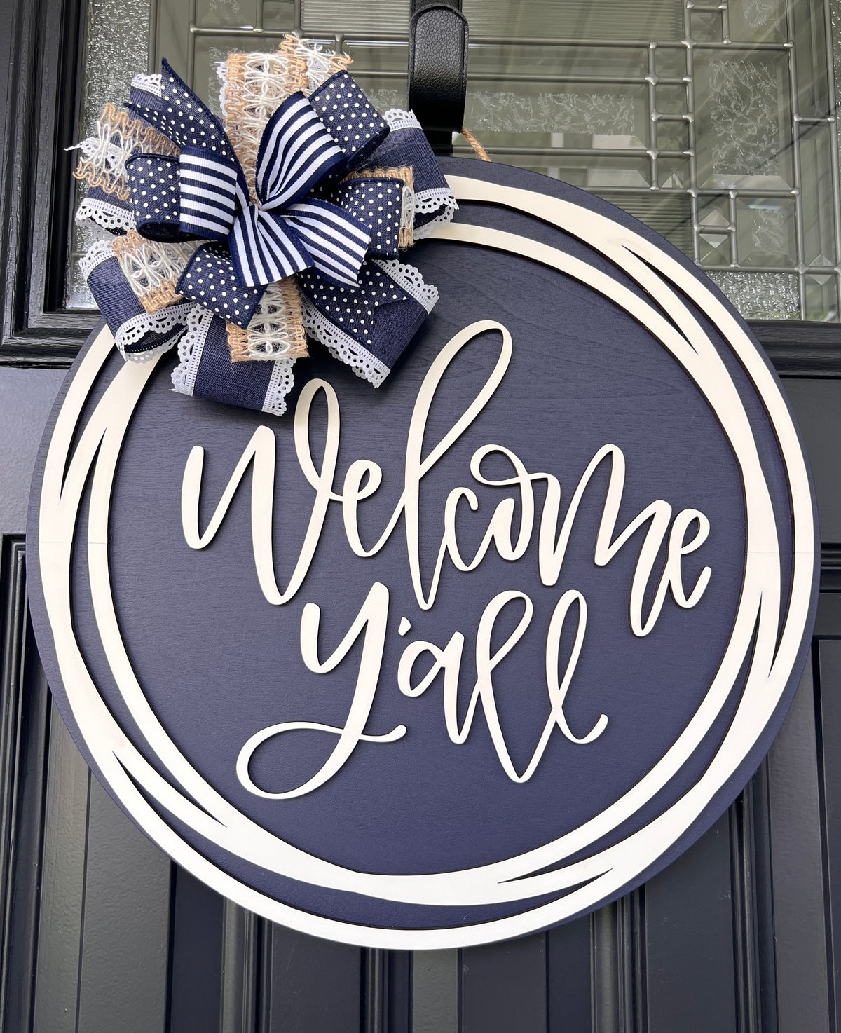 Welcome Y'all navy door hanger with decorative bow - straight on view