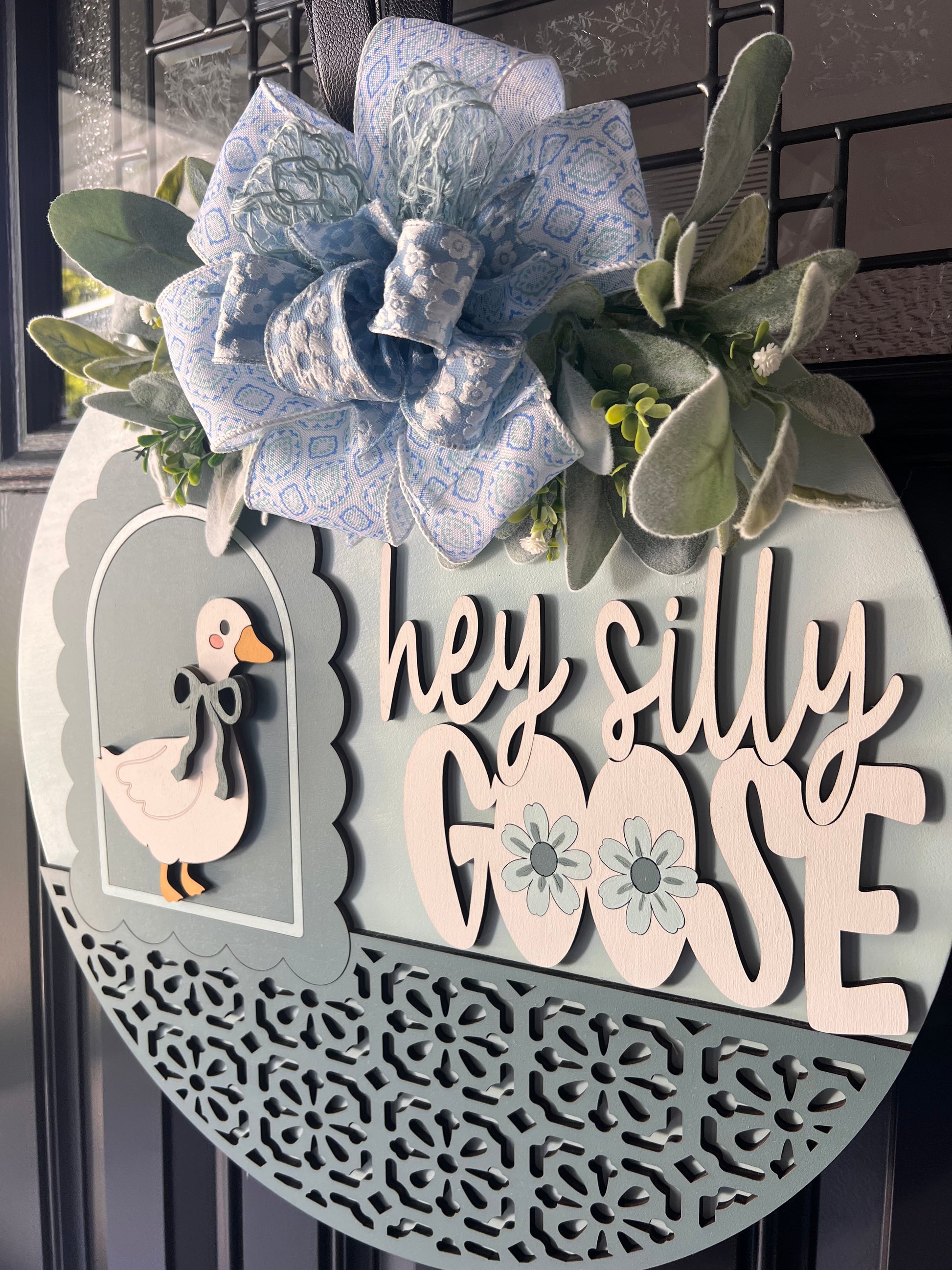 spring summer door decor goose sign with bow greenery soft blue green palette